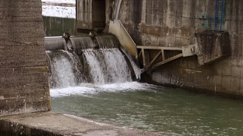 Flow of water through the dam Stock Footage 107744023