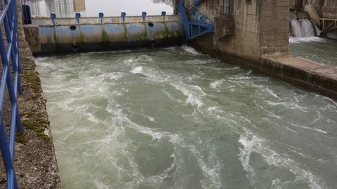 Flow of water through the dam Stock Footage 107744262