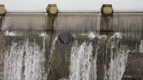 Flow of water through the dam Stock Footage 107744334
