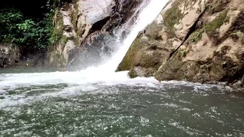 Flow of Water from a Waterfall Stock Footage 232564217