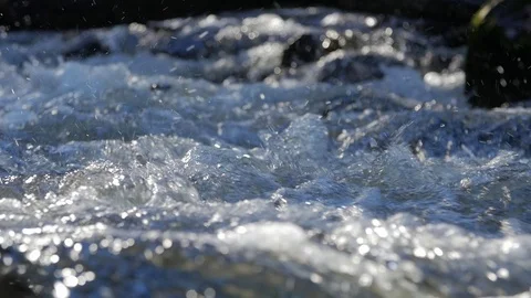 Flow of water with white foam close-up Stock Footage 82543844