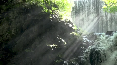 Flow of the Waterfall and Rays of Light Stock-Footage 330801450