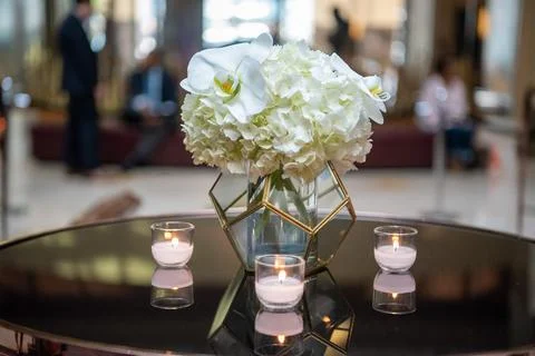 Flower and candle table setting at elegant affair. Stock Photos