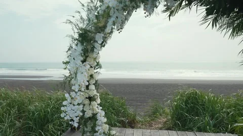Flower arch on the beach Stock Footage 169982135