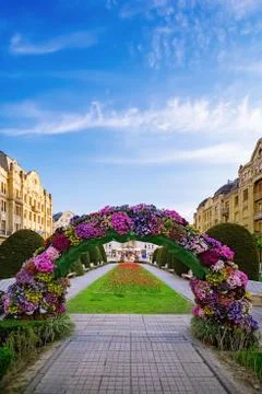 Flower arch on the square Stock Photos