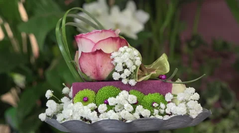 Flower arrangement shaped as a cake Video stock 56882897