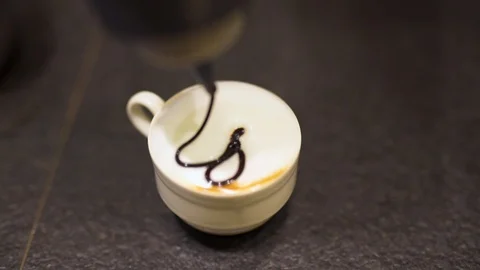 Flower art on a surface of latte in café Stock Footage 108731696