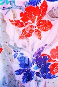 Flower batik background with fabric texture Stock Photos