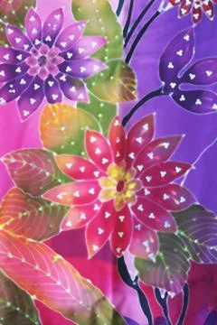 Flower batik background with fabric texture Stock Photos