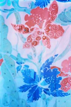 Flower batik background with fabric texture Stock Photos