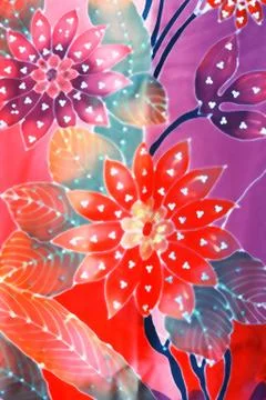 Flower batik background with fabric texture Stock Photos