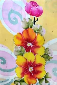 Flower batik background with fabric texture Stock Photos