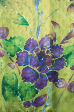 Flower batik background with fabric texture Stock Photos