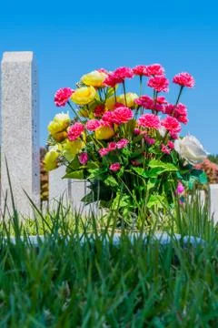 Flower bouquet at cemetery Stock Photos