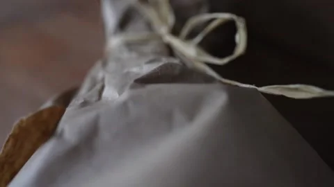 Flower bouquet macro wrapper and twine. Natural colours Stock Footage 138587413