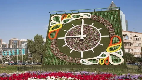 Flower Clock Almaty Panorama Time Lapse 4K Stock Footage 69078413