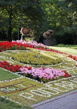 Flower clock on the colonnade in a small spa town Podebrady Stock Photos