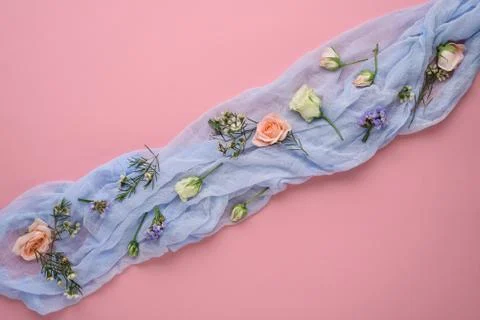 Flower composition on pink background, rose buds, eustoma, limonium infloresc Stock Photos
