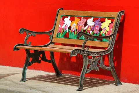 Flower decorated park bench Stock Photos