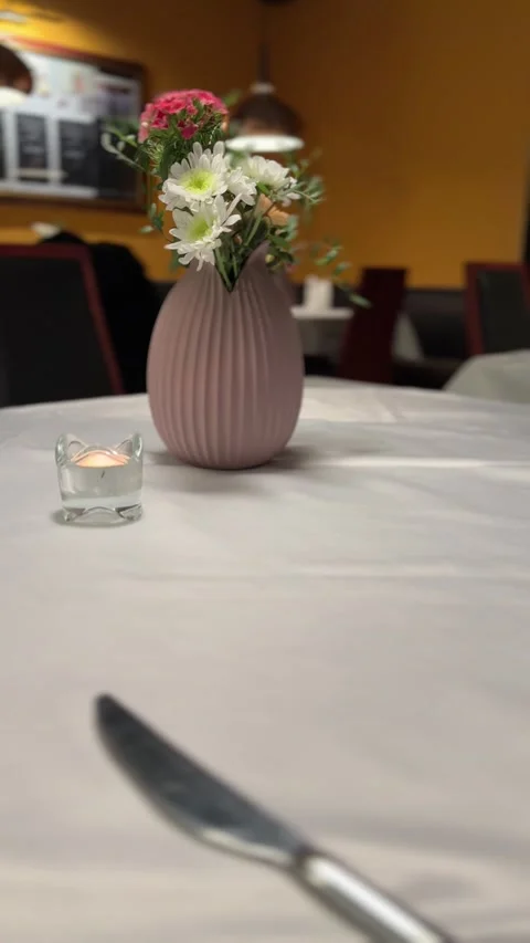 Flower decoration on restaurant table Stock Footage 296371510