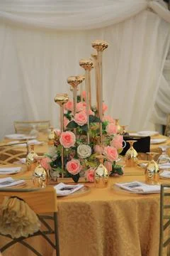 Flower decorations on the wedding function and the background is in blur Stock Photos