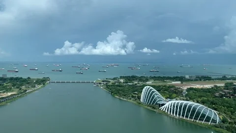 Flower Dome and Cloud Forest, with Marina barrage dam. Video stock 301181347