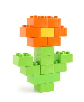 Flower made of plastic building blocks on white background Stock Photos