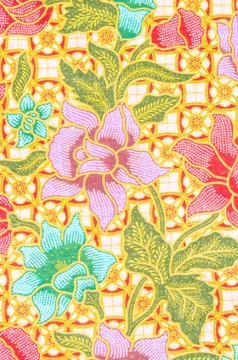 Flower pattern background on batik fabric. Foto stock