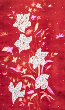 Flower pattern batik on red background Stock Photos