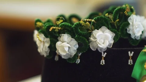 Flower pattern on a hat and a golden crown as accessories in the Sorbian Video stock 119214939