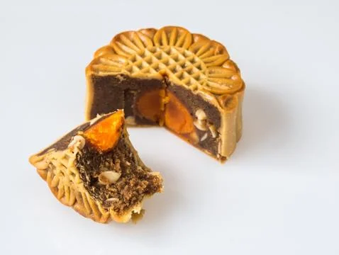 Flower pattern moon cakes on white back ground Stock Photos