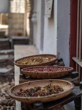 Flower petals drying in baskets Stock Photos