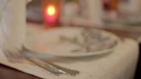 A flower is placed on a dinner plate Stock Footage 24055318