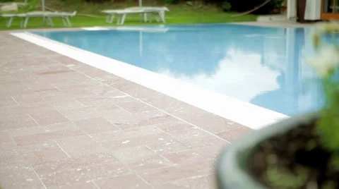 Flower Pot by the Pool Stock Footage 36052804