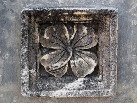 A Flower Sandstone Panel on the Wall Stock Photos