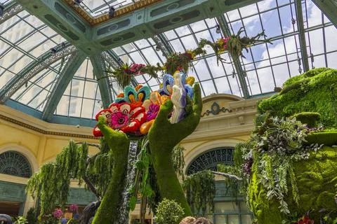 A flower sculpture in the shape of hands holding flowers at Bellagio Conser.. Stock Photos