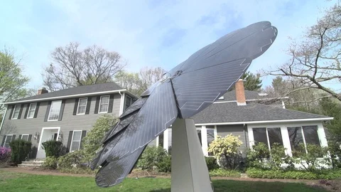 Flower shaped solar panel in garden Stock Footage 93525656