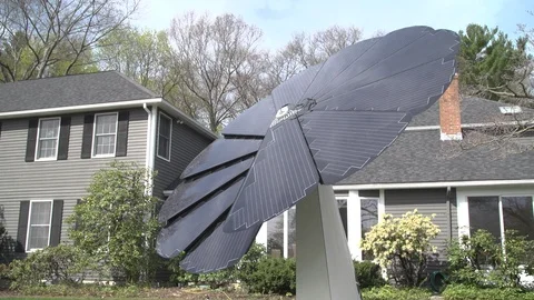 Flower shaped solar panel in garden Stock Footage 93577703