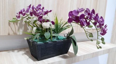 Flower in vase on the table Stock Photos