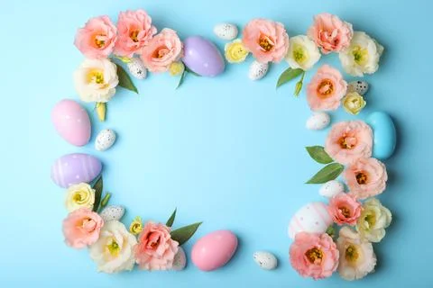 Flowers and Easter eggs on a colored background close-up. Easter background Stock Photos
