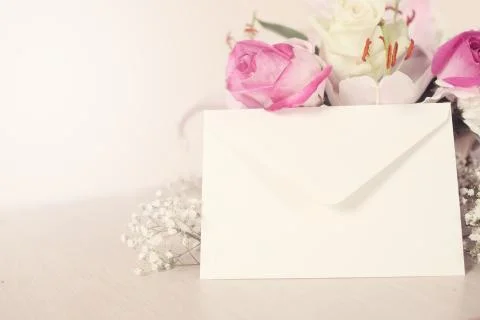 Flowers and envelope Stock Photos