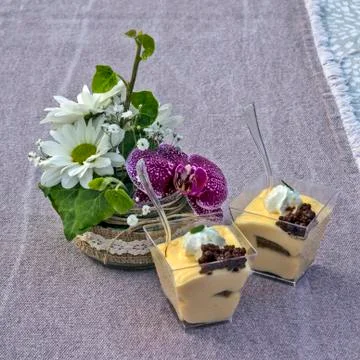 Flowers and pudding Stock Photos