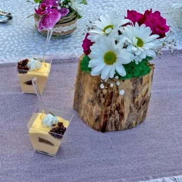 Flowers and pudding Stock Photos