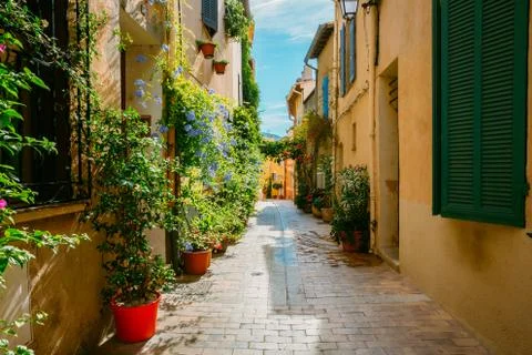 Flowers are in pots outside beautiful old European town Stock Photos