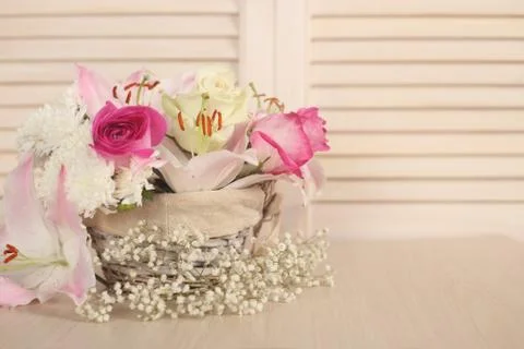 Flowers in basket Stock Photos