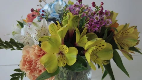 Flowers in bloom in a vase. Stock Footage 152235763
