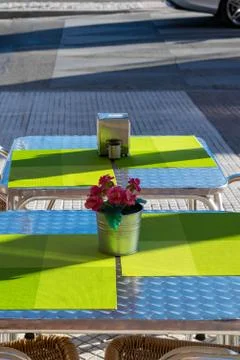 Flowers on a cafe table in a cafeteria. Stock Photos
