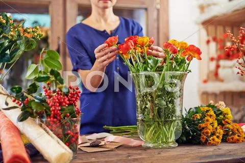 Flowers at florist workplace Stock Photos