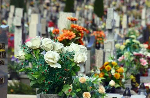Flowers on the grave Stock Photos
