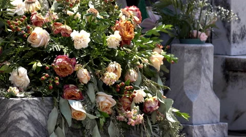 Flowers at gravestone in graveyard 4k Stock Footage 55240601